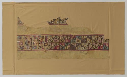 Fragment met veelkleurige geometrische motieven by anonymous