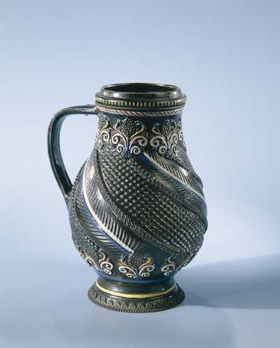 Jug with twisted borders with scale and fishbone motif by anonymous