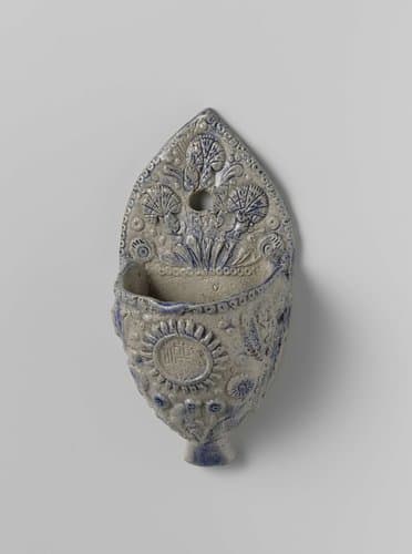 Holy water stoup with angel's heads and flowering plants by anonymous