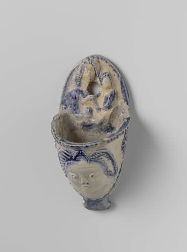 Holy water stoup with an angel's head and Madonna and Child by anonymous