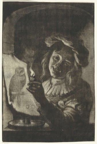 Jongen met een prent waarop een uil bij kaarslicht by Aert Schouman