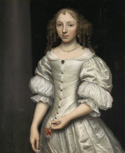Portret van een vrouw met een bloem in haar hand