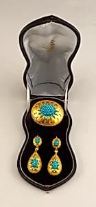Earrings, bracelet and brooch by Unknown