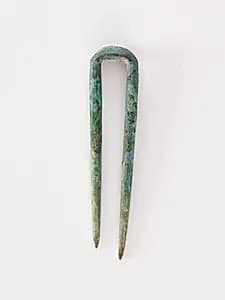 Topknot pin by Unknown