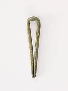 Topknot pin by Unknown