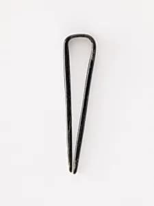 Topknot pin by Unknown