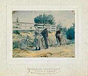 Woman on Bicycle by Unidentified
