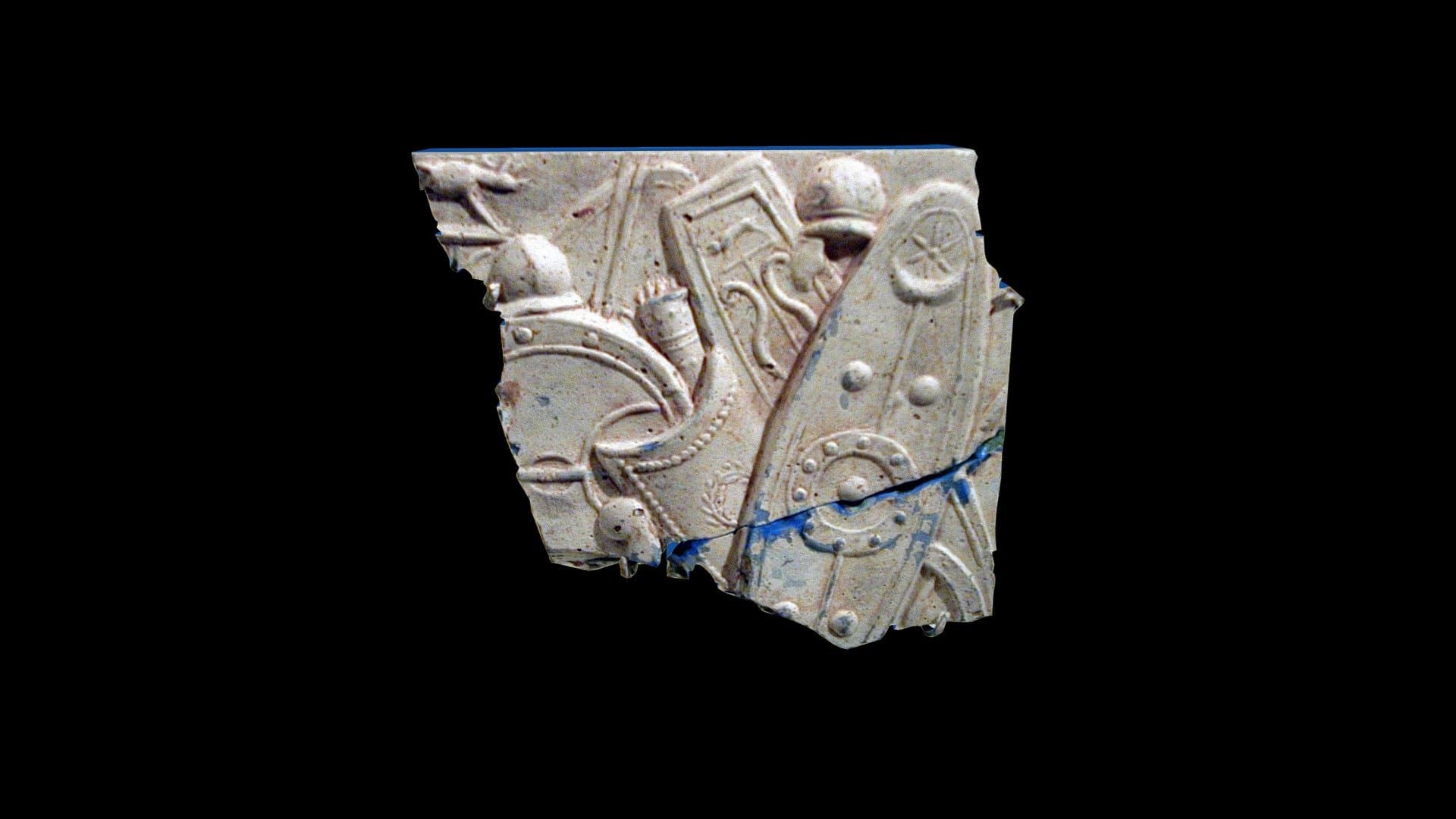Glass relief fragment, blue edges