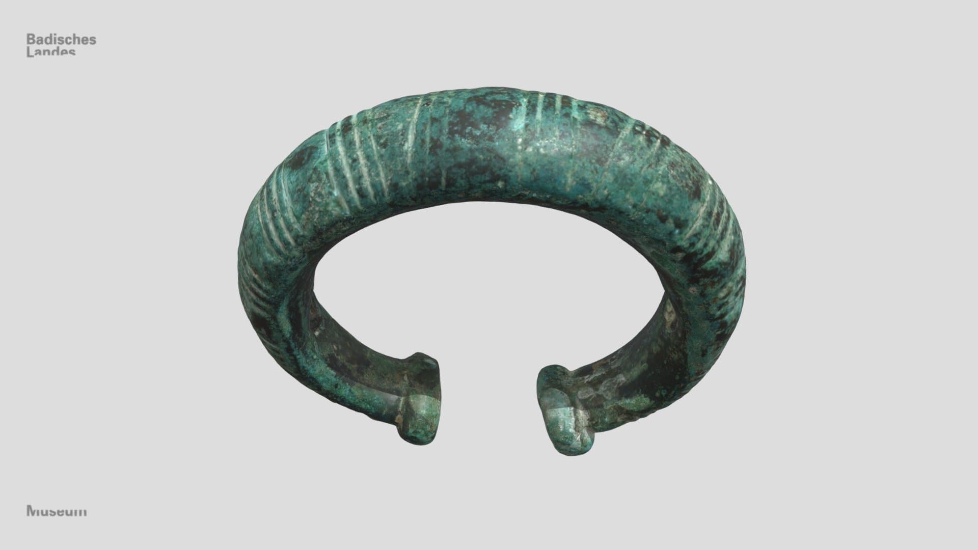 Hohl gegossener Bronzearmring mit Stempelenden