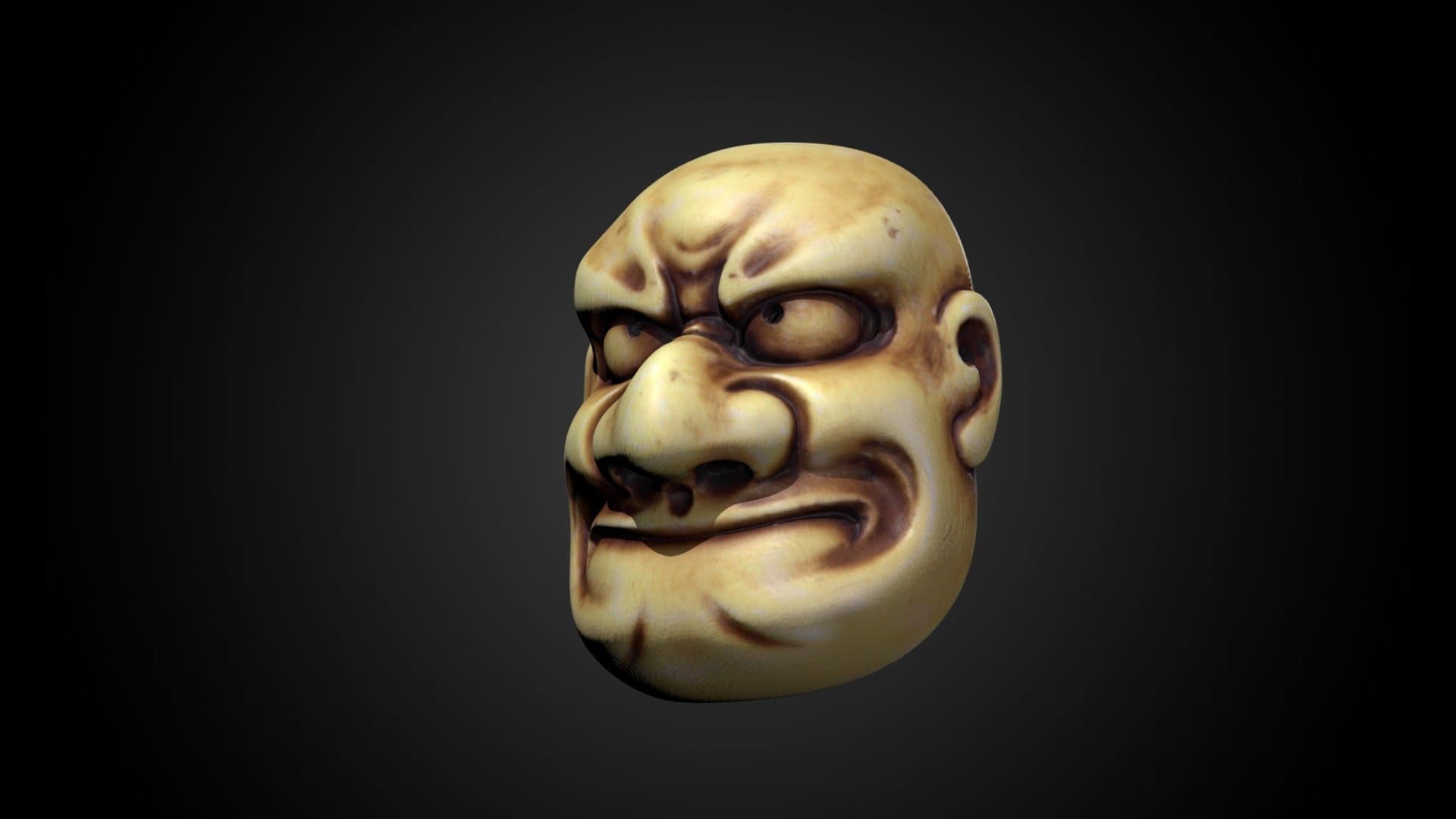 Noh mask netsuke by Kōgetsu