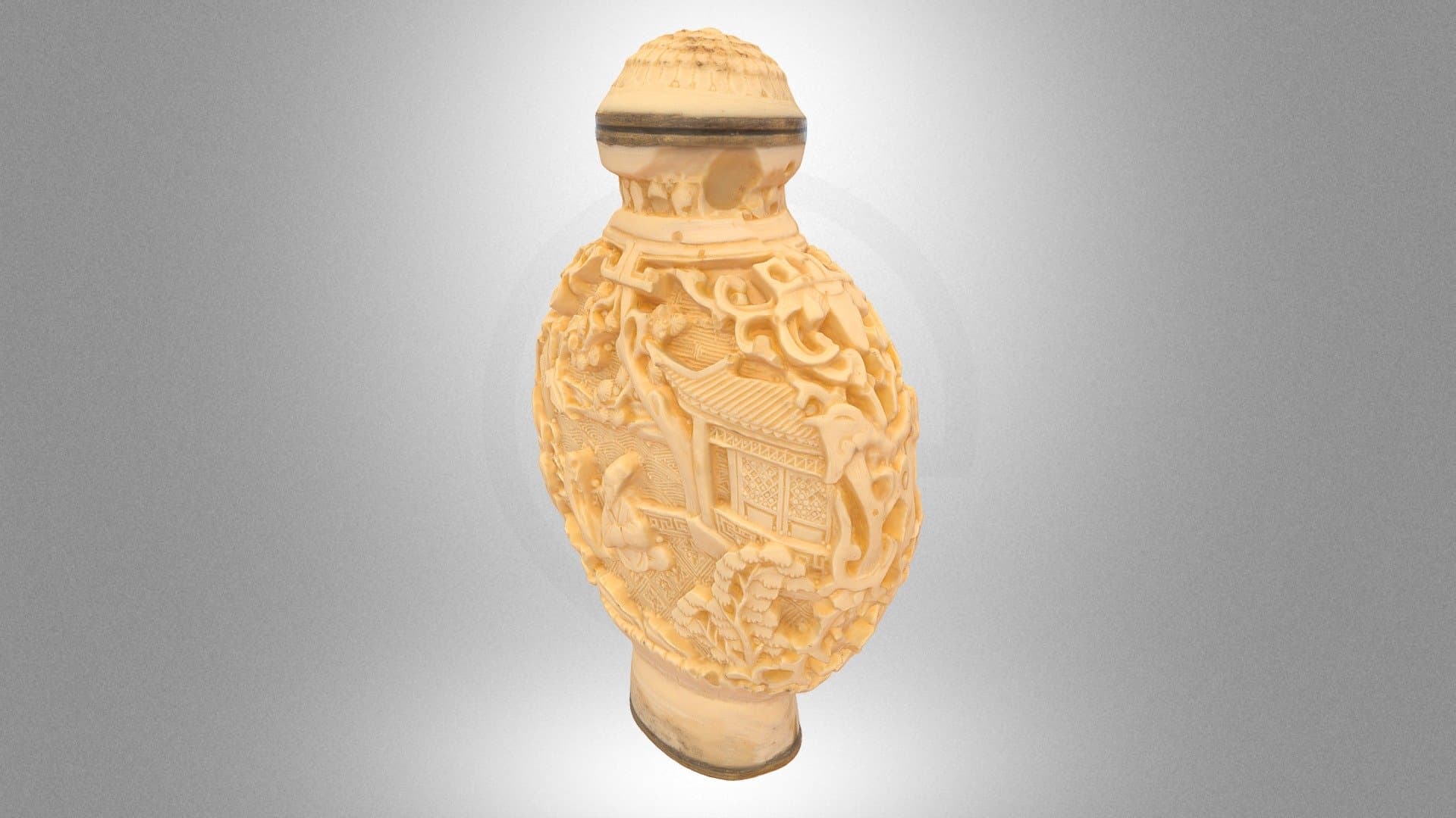 Carved perfume bottle