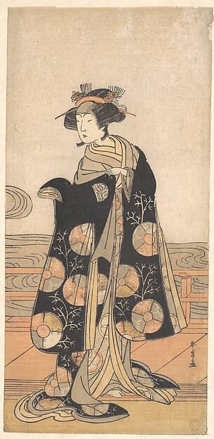 Yoshizawa Iroha as a Woman Standing on the Engawa of a House by a River