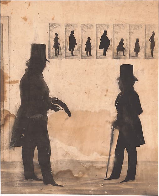 Two Men, One Cutting a Silhouette