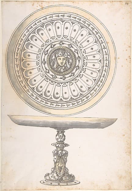 Shallow Round Dish on tall Pedestal Decorated with Fruit and Female Masks