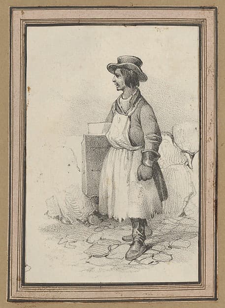 Man wearing an apron and a hat