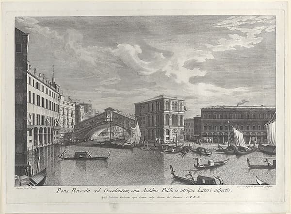 The Rialto Bridge, Venice, with boats and gondolas in the water