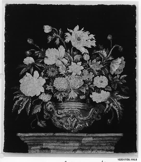 Flowers in a silver vase