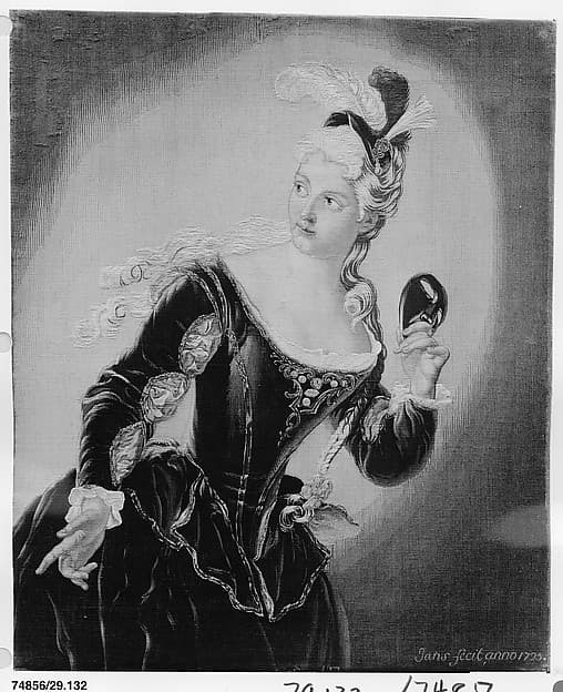 Young Woman Holding a Mask