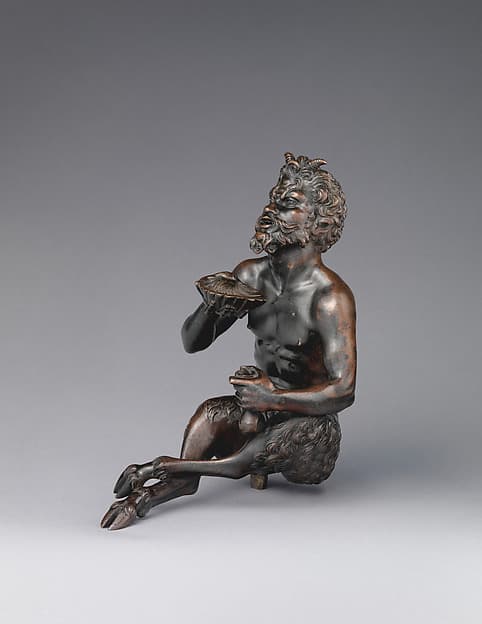 Seated satyr with a shell