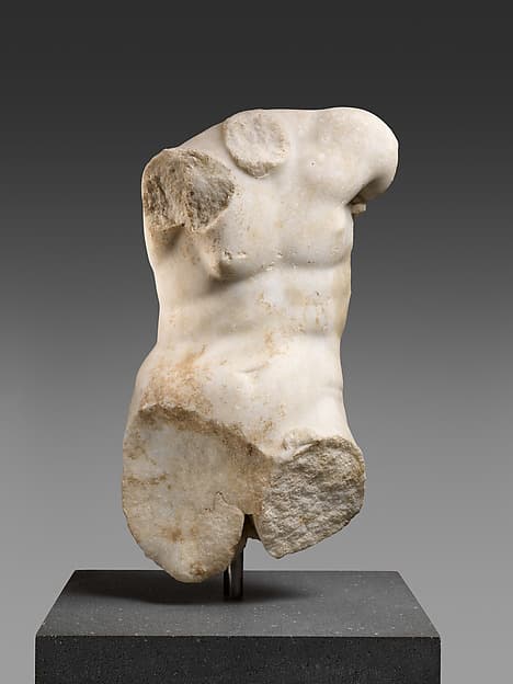 Marble torso of a seated man