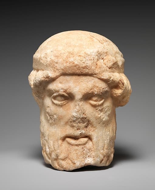 Marble herm head of a bearded deity
