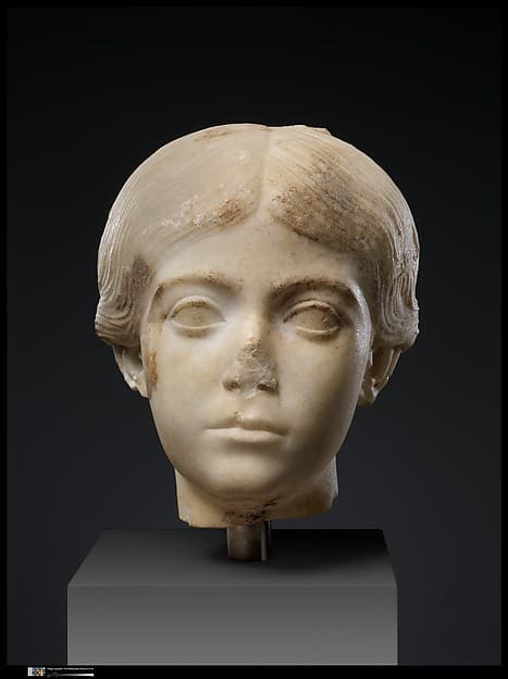 Two marble portrait heads from a relief