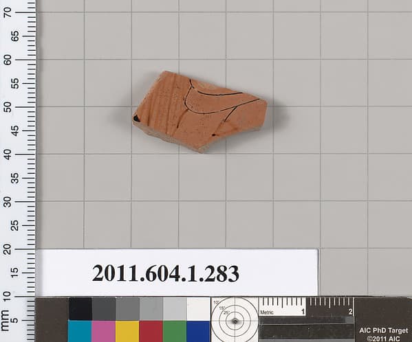 Terracotta fragment of a kylix (drinking cup)