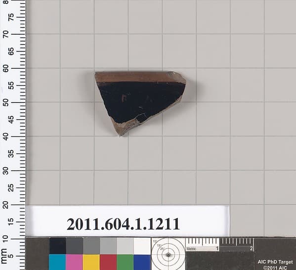 Terracotta rim fragment of a kylix (drinking cup)