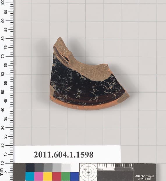 Terracotta fragment of a kylix (drinking cup)