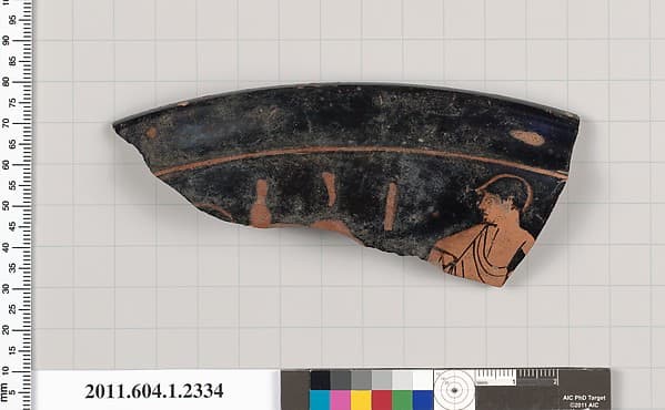 Terracotta rim fragment of a kylix (drinking cup)