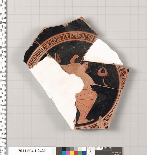 Terracotta fragment of a kylix (drinking cup)