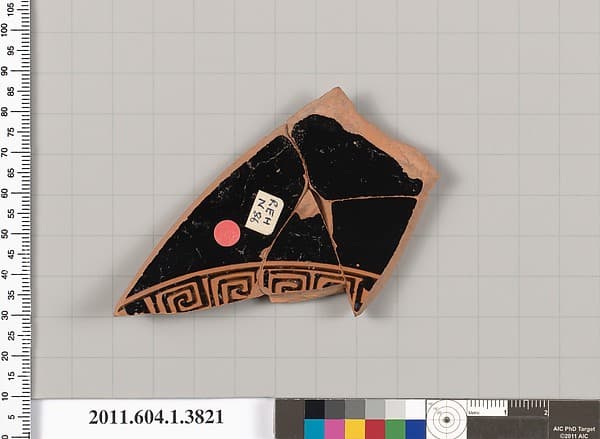Terracotta fragment of a kylix (drinking cup)