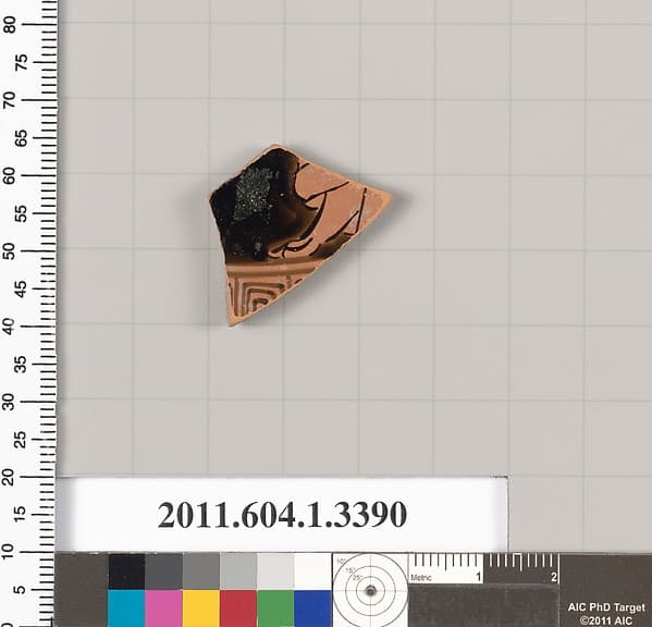 Terracotta fragment of a kylix (drinking cup)