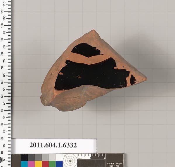 Terracotta fragment of a kylix (drinking cup)