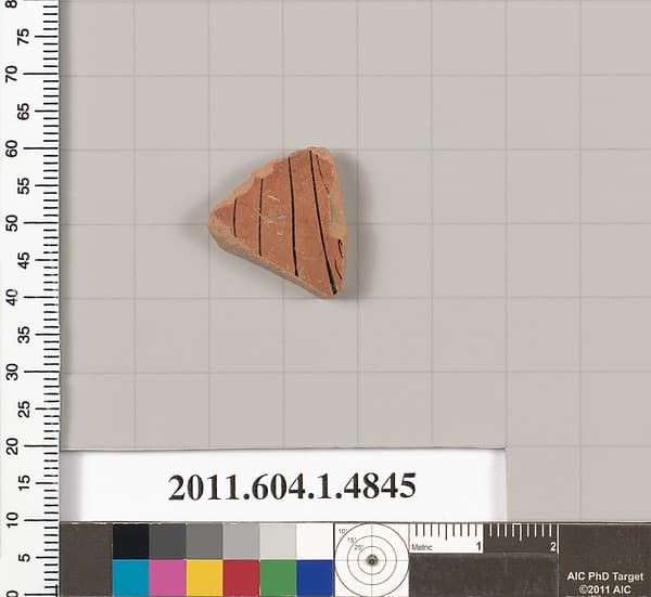 Terracotta fragment of a kylix (drinking cup)