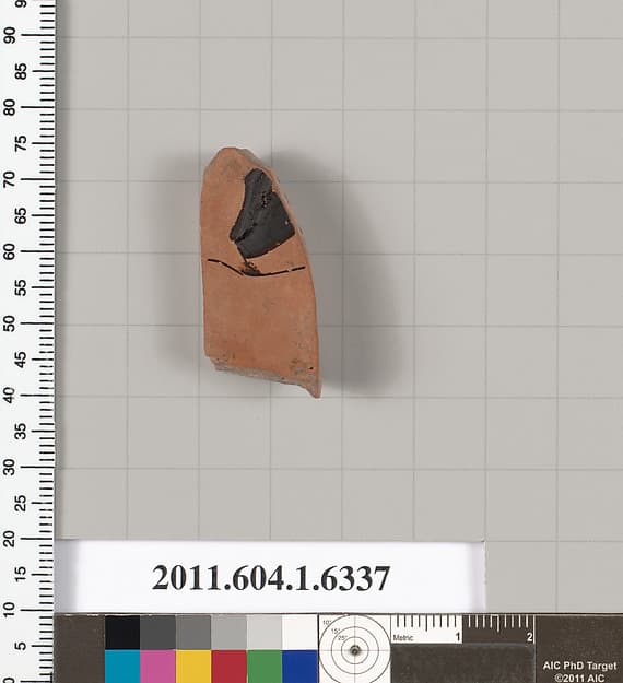 Terracotta fragment of a kylix (drinking cup)