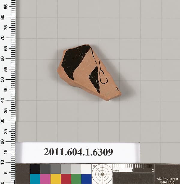 Terracotta fragment of a kylix (drinking cup)