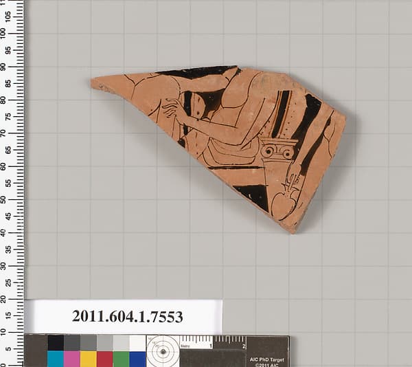 Terracotta fragment of a kylix (drinking cup)