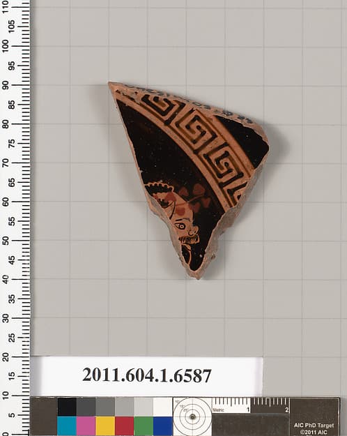 Terracotta fragment of a kylix (drinking cup)