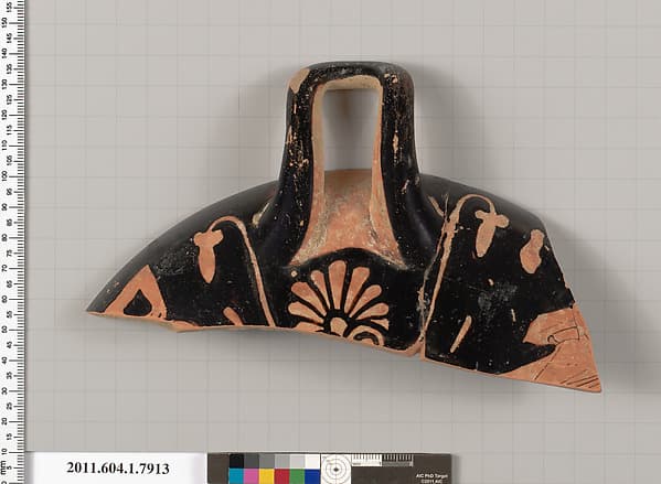 Terracotta fragment of a kylix (drinking cup)