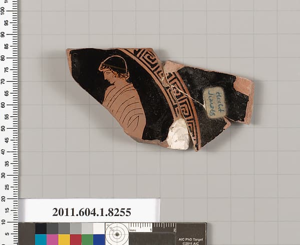 Terracotta fragment of a kylix (drinking cup)