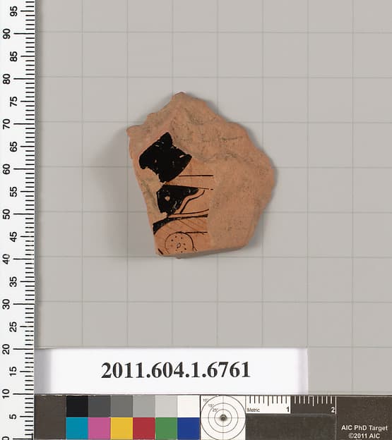 Terracotta fragment of a kylix (drinking cup)