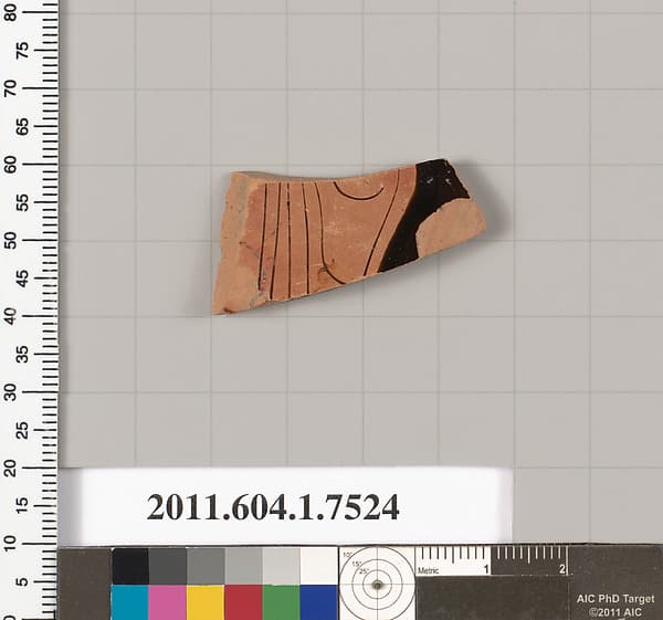 Terracotta fragment of a kylix (drinking cup)