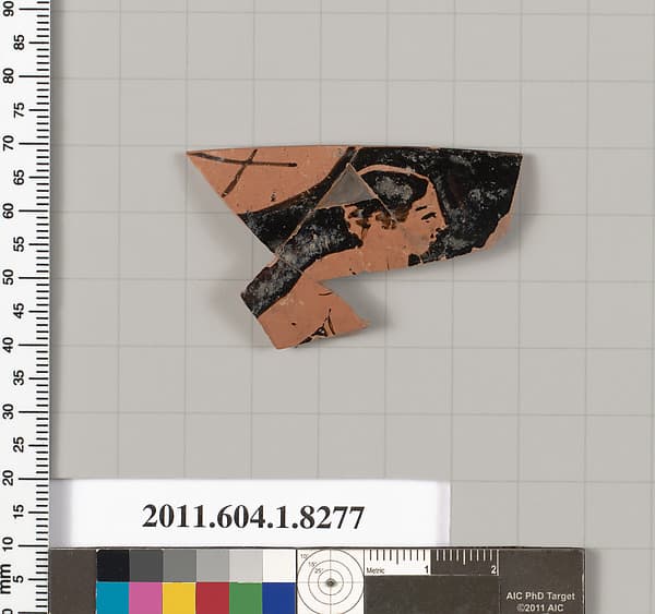 Terracotta rim fragment of a kylix (drinking cup)