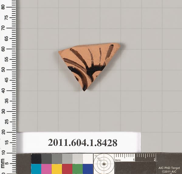 Terracotta fragment of a kylix (drinking cup)