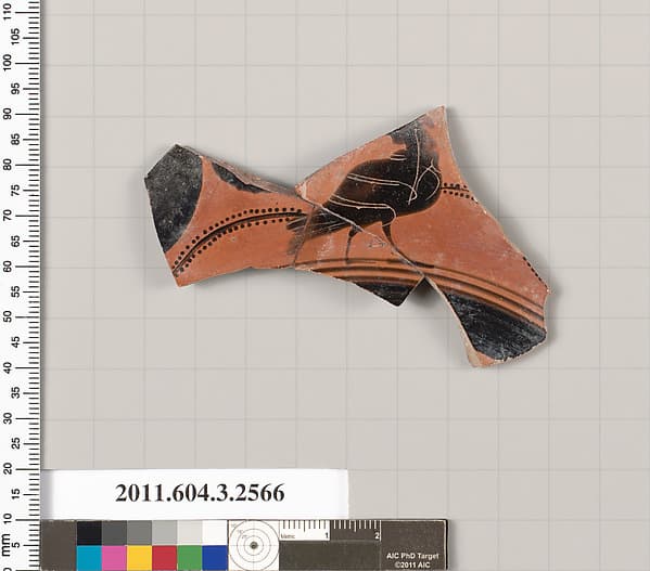 Terracotta fragment of a kylix: eye-cup (drinking cup)