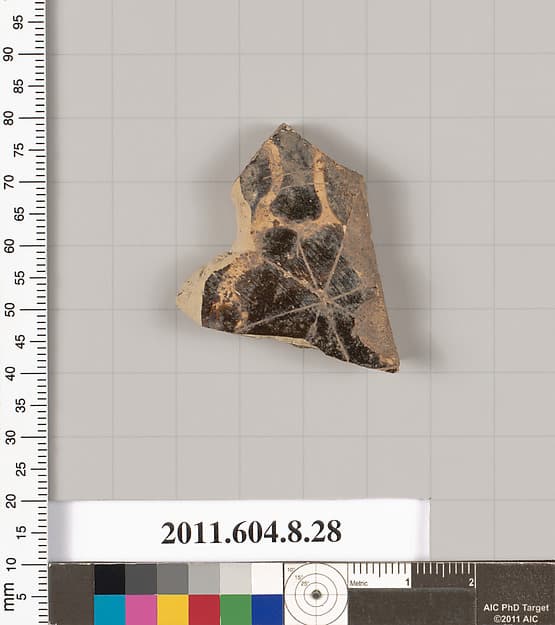 Terracotta fragment of a closed shape