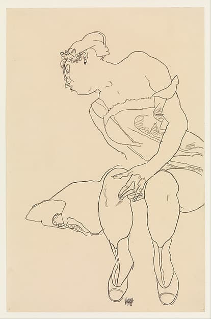 Seated Woman in Corset and Boots