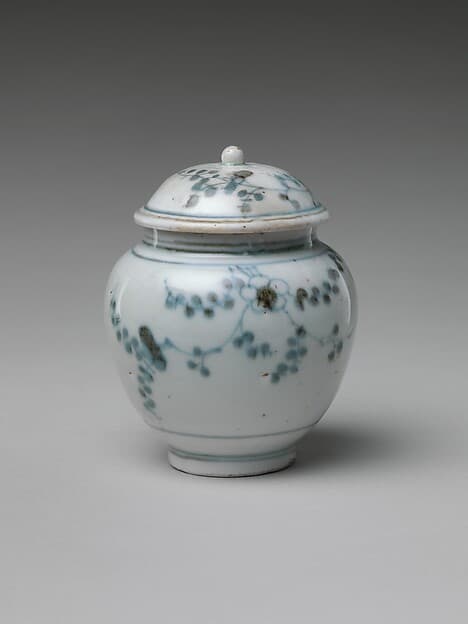 Jar and Lid with Flowering Plant