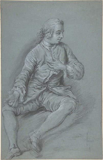 Young Man Seated on the ground with his left hand at his chest